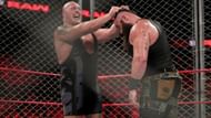 Braun Strowman is in a steel cage with Kevin Owens